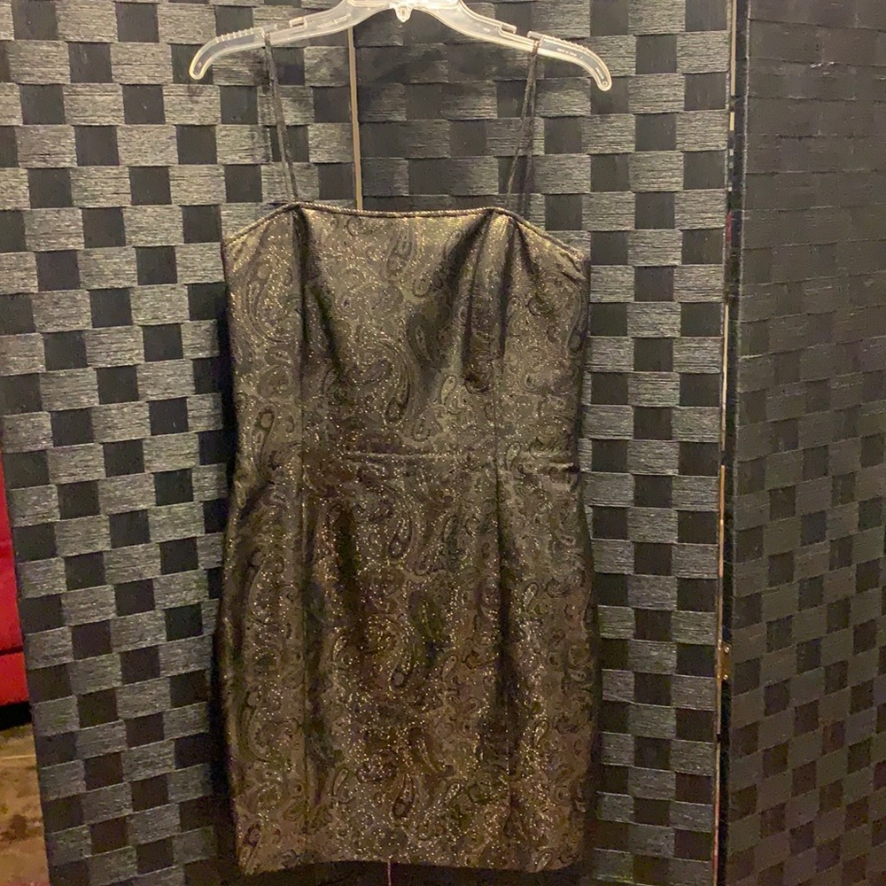 Gold cocktail dress with black accented design